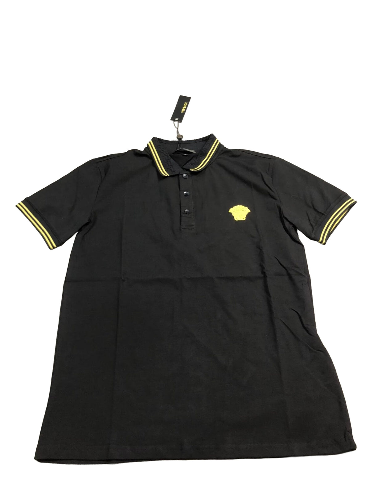 Black gold trim polo on white background
